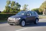 2013 BMW X5 xDrive50i in Sparkling Bronze Metallic - Driving Front Left Three-quarter View